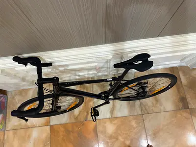 black road bike - lightweight frame, drop bars gaint new