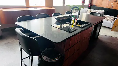 Modern Wooden Kitchen Island with Black Quartz Top and Built-in Sink