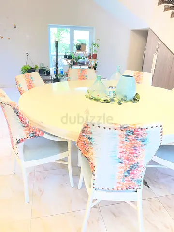 White round dining table with 8 chairs - good condition