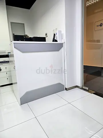 Compact white reception counter with Chair