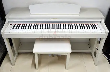 The Kurzweil M230 WH (White) is a spinet-style home digital piano combining a classic cabinet aesthe
