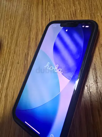 iPhone 13 256gb in good working condition with protective case