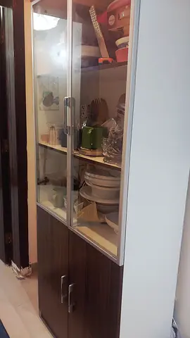 IKEA glass-door display cabinet with wooden finish - good condition
