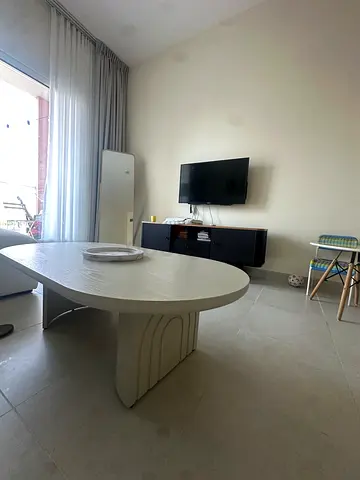 Modern Oval Center Table with Textured Base