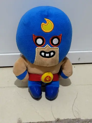 Blue masked wrestler plush toy (soft stuffed figure)