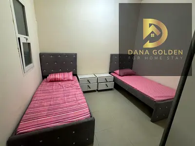 A furnished two-bedroom apartment with a living room is available