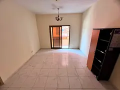 Central A/C Building with 2 Bathrooms, Prime Location near Al Hikmah School | Al Nuaimiya