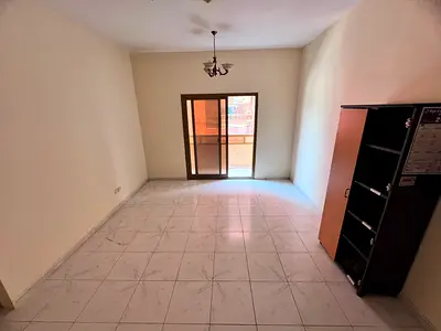 Central A/C Building with 2 Bathrooms, Prime Location near Al Hikmah School | Al Nuaimiya