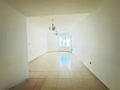 One-bedroom apartment with living room in Al Taawun; includes pool, gym, and free parking.