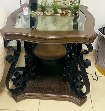 Wooden Side Table with Decorative Scrollwork and Glass Top
