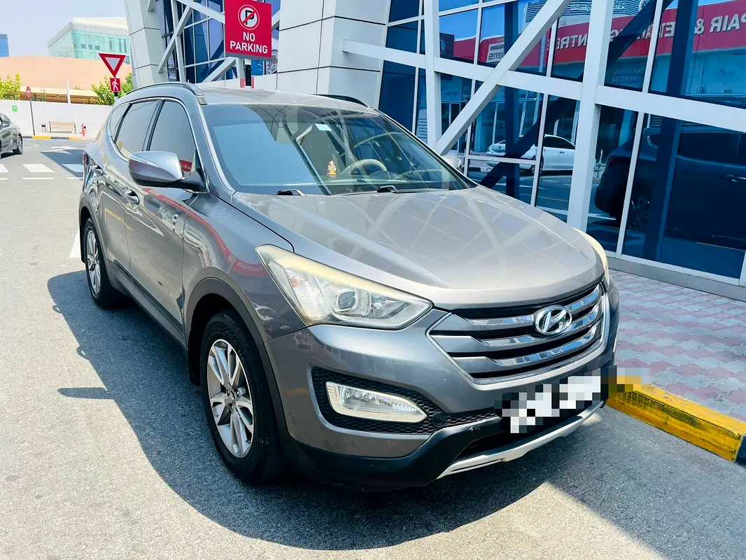 Hyundai Santa Fe 2014 — photo 1 of 12