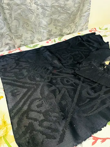 Apart of Holy Kaaba dress since 1402 Hijri. جزء من قماش الكعبة المقدسة من سنة 1402 هجرية