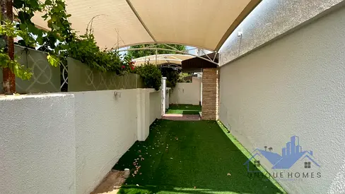 4 BHK + MAIDS ROOM SEMI ATTACHED VILLA WITH A SMALL GARDEN AT AL GARHOUD