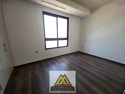 Two bedrooms and a living room with a balcony offering an open view in Al Jurf 2, a prime location close to schools, markets, and all services.