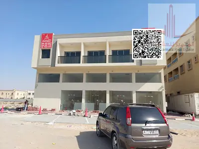 One-bedroom apartment with a living room and central air conditioning; Al Jurf Industrial Area 2, Al Khalid Building.