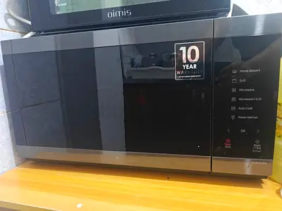 Samsung Microwave 40L Dial Grill MWO With Seamless  Recessed Handle Design and Sheath Heater