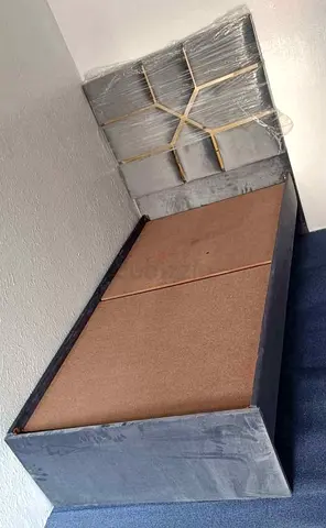 Single grey upholstered bed frame with headboard - good condition