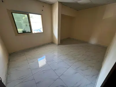 غرفة وصالة_ مطبخ أمريكي_تكييف مركزي_ شارع الكويت_ سهل المخرج للشارقة ودبي.