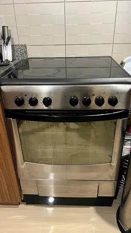 Stainless steel freestanding electric oven with glass ceramic hob