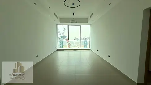 A two-bedroom apartment with a living room is available for rent in Al Mamzar, Sharjah.