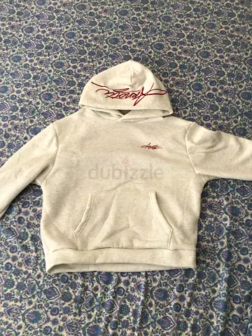 Light grey pullover hoodie with red script logo, size XS