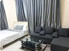 A fully furnished room with attached bathroom and balcony , gym, swimming pool.