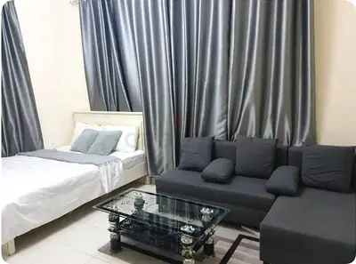 A fully furnished room with attached bathroom and balcony , gym, swimming pool.