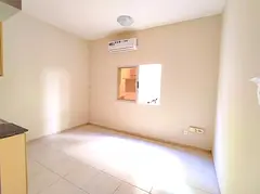Low Cost Living!!! Spacious Studio apartment Available For Family only in 88k, Close to Dubai Exit,