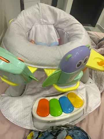 Baby jumper activity seat with toy piano - good condition