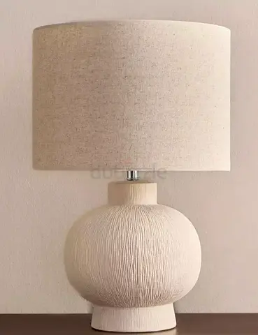 Cream textured ceramic table lamp with fabric drum shade