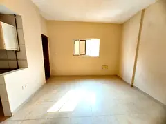 Elegant Studio in a Quiet Building with separate kitchen with central ac just under 15000 AED