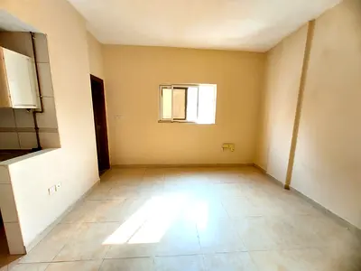Elegant Studio in a Quiet Building with separate kitchen with central ac just under 15000 AED