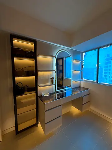 Built-in vanity dressing table with illuminated shelving and drawers