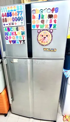 Silver Hitachi Top-Freezer Refrigerator - Good Working Condition