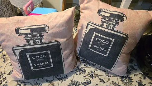 Set of 2 decorative Coco Chanel perfume print throw cushions/pillows - light pink