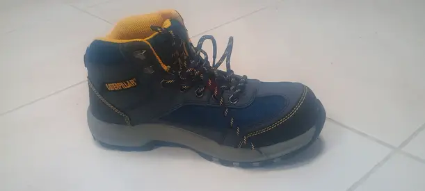 Pair of mens hiking boots, size unknown - blue/black with yellow lining