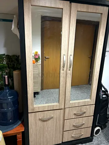 Wooden wardrobe with mirror and drawers - good condition and Saturday. Has 10 compartments in total.