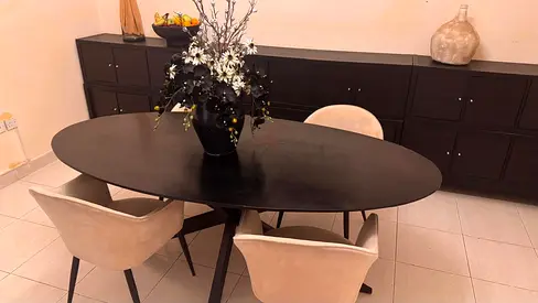 Styling Black Oval Dining Table with 4 Beige Chairs