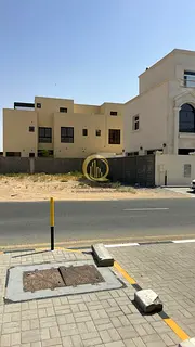 For sale: residential land in Al-Houshi area, Al-Badiya suburb, Sharjah Emirate. In a very excellent
