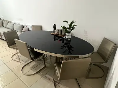 Urgent selling Modern oval black glass dining table with 6 chrome-frame chairs