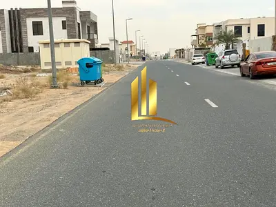 Residential land for sale in Al-Hawshi, Al-Badi'a suburb, Sharjah, at an excellent price. Freehold ownership for Arab brothers.