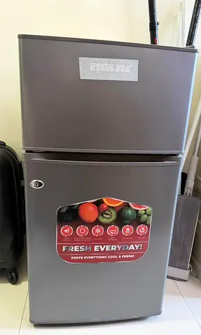 Compact double-door mini fridge - good condition