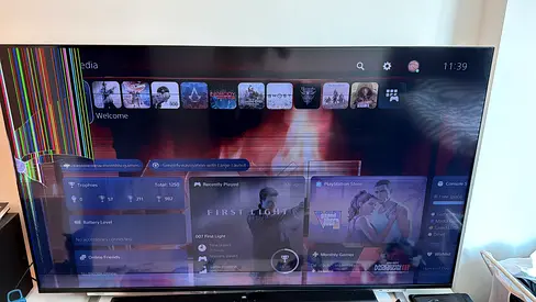 Broken Toshiba 65-inch TV – cracked LCD panel – powers on – for parts only