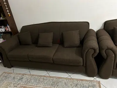 Five-seater brown fabric sofa in good condition