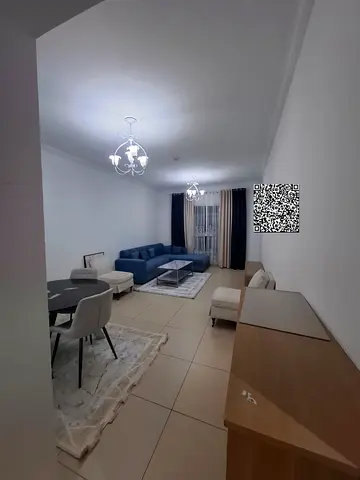 A fully furnished one-bedroom apartment is available for monthly rent in Ajman's Al Yasmin Towers,