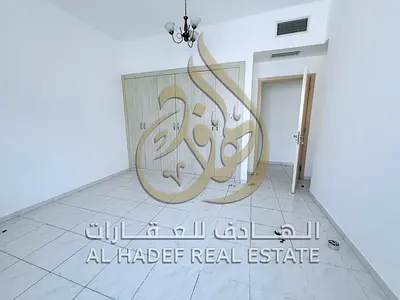 Three bedrooms and a living room in the Al Taawun area – free parking – balcony – dressing room – l