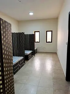 NEXT TO BUS STOP EXECUTIVE BED SPACE IN SILICON OASIS