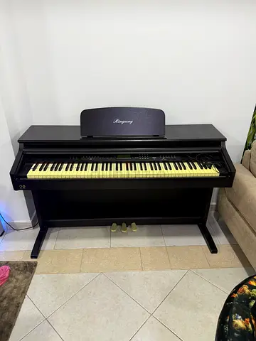 Used digital piano with stand and pedals - good condition