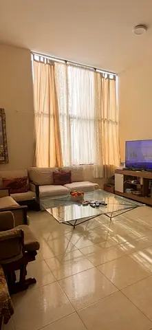 Glass Coffee Table with Geometric Metal Base - Modern Living Room Piece