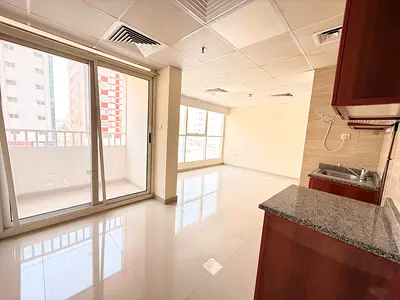 NO DEPOSIT CASH DOUBLE STUDIO WITH BALCONY ON ROAD BUILDING IN MUWAILEH